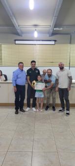 Homenagem a campeões 